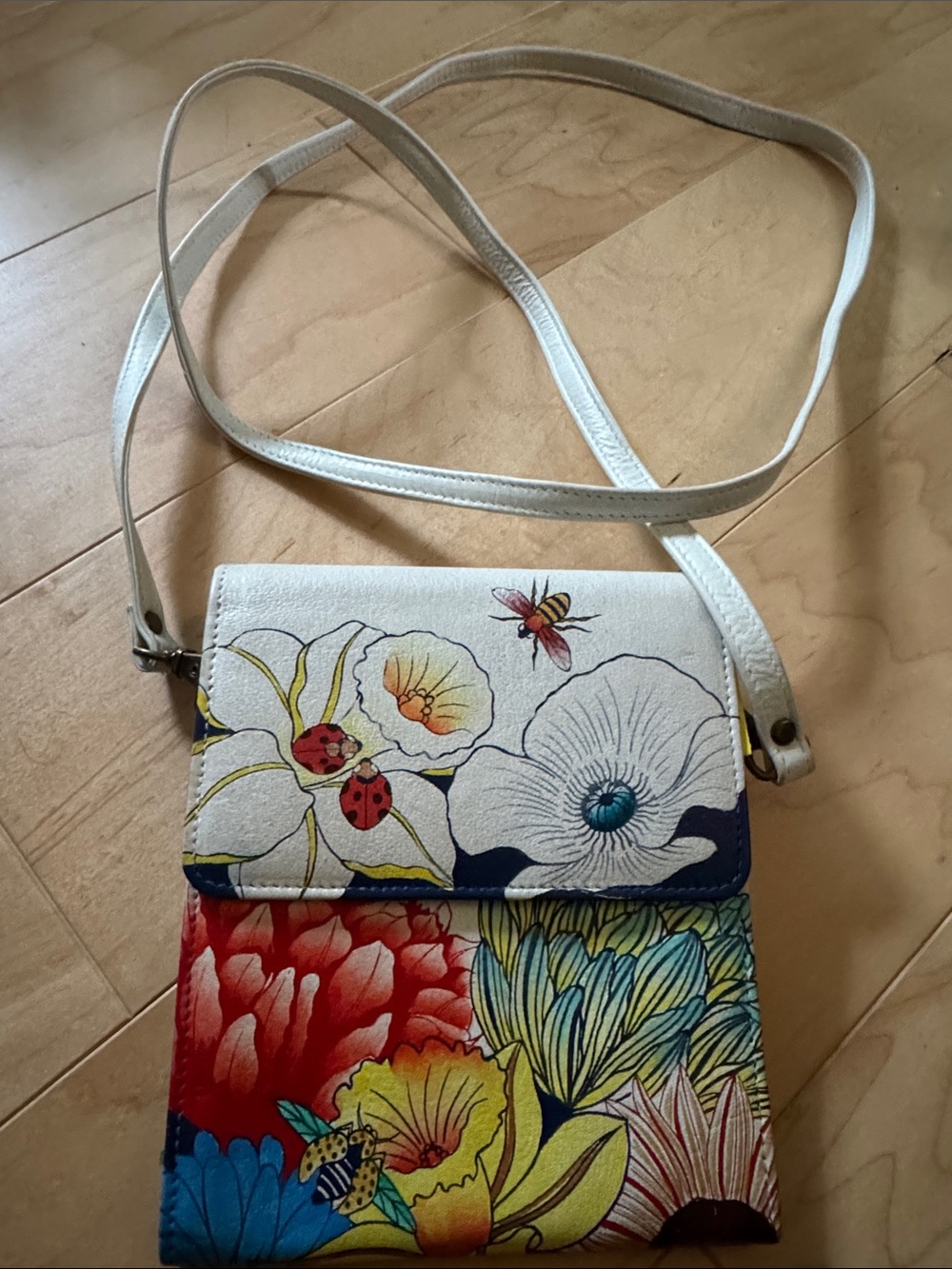 Anuschka White Crossbody Bag with Multicolor Floral and Insect Motif